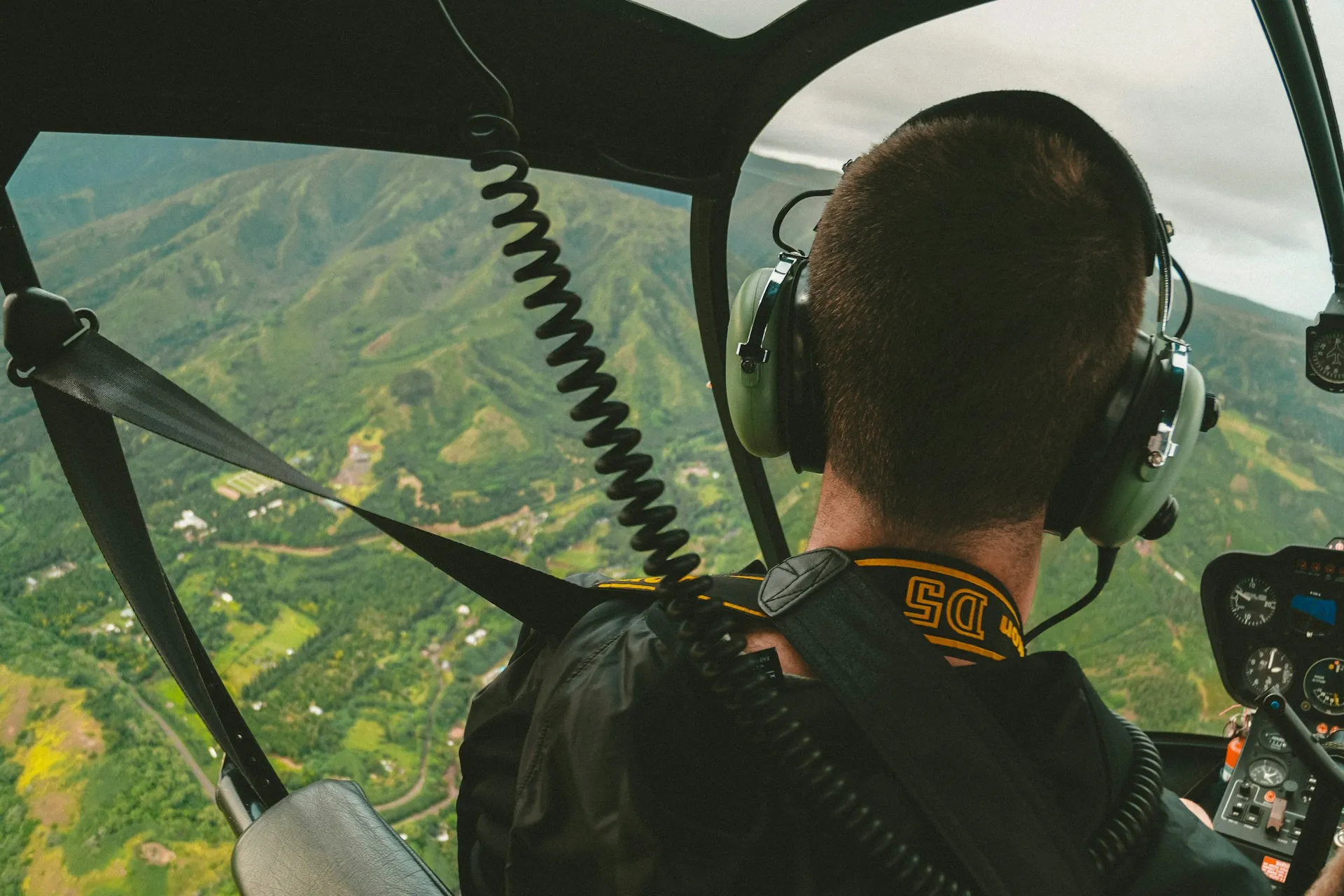 Helicopter tour over lush volcanic valleys and mountains, Hawaii