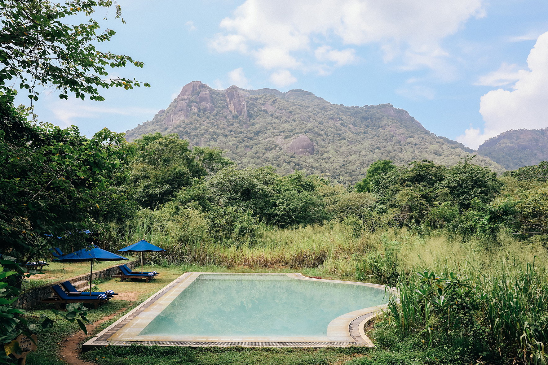 Asia, Sri Lanka, Gal Oya, Pool with sunloungers 