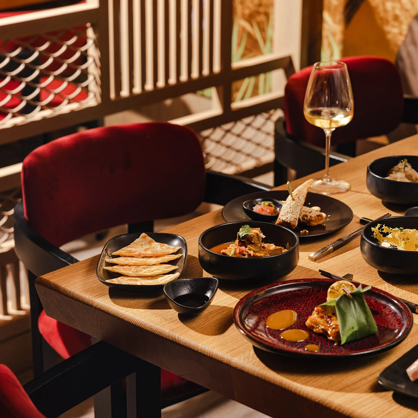 A table set with small plates of food onboard the Explora I cruise ship