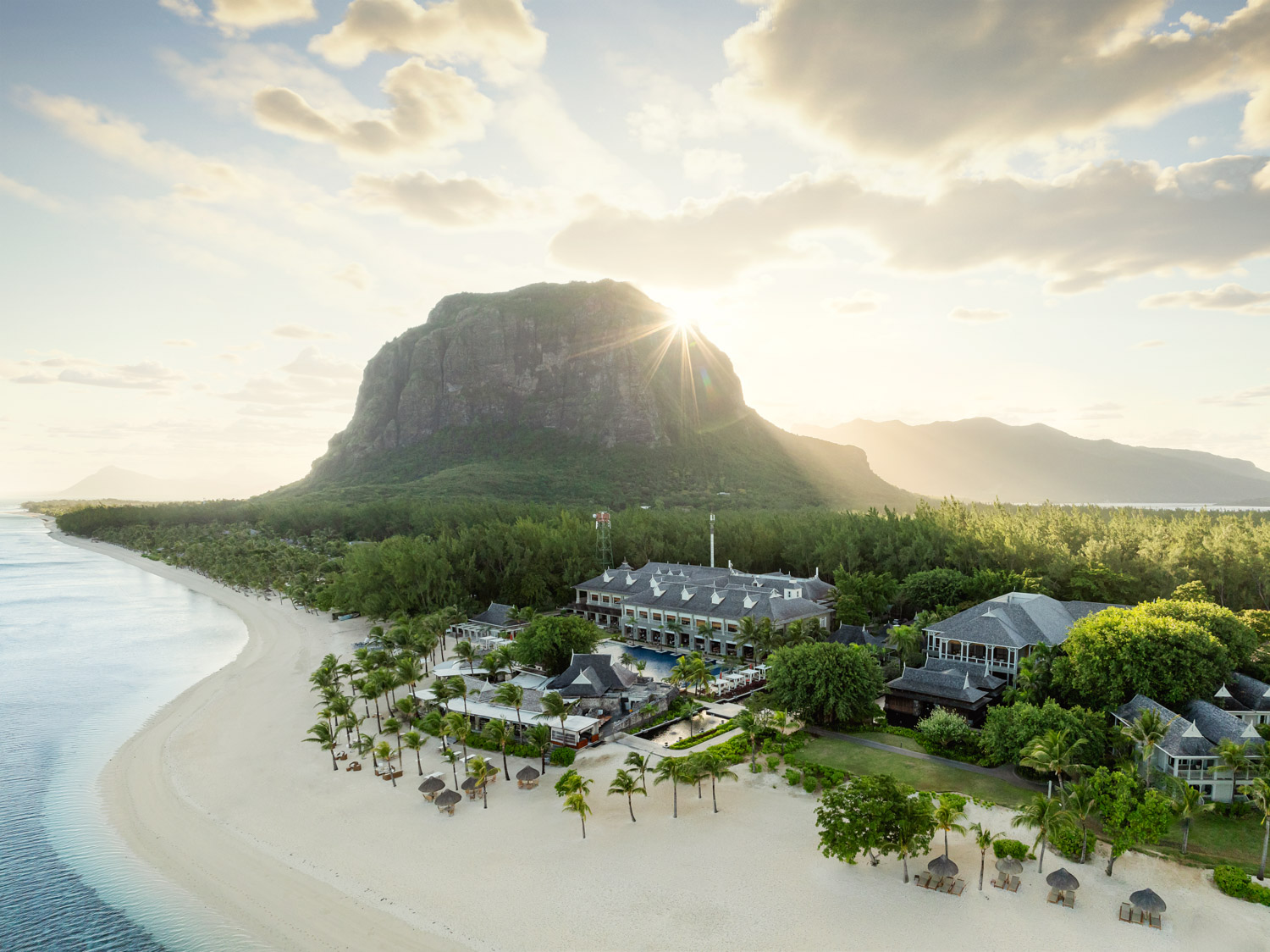 Indian Ocean, Mauritius, St. Regis Le Morne, resort aerial overview with the beach in front and the Le Morne mountain behind 