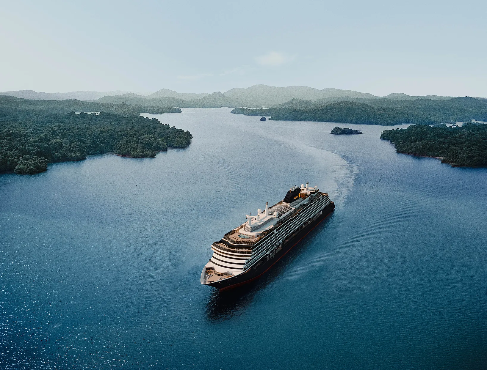 Cruise, Explora Journeys, Explora III cruise ship sailing on open blue waters with forests in the background