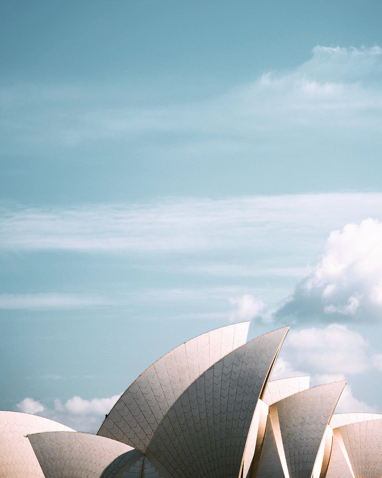 Roof of the Sydney Opera House with blue sky