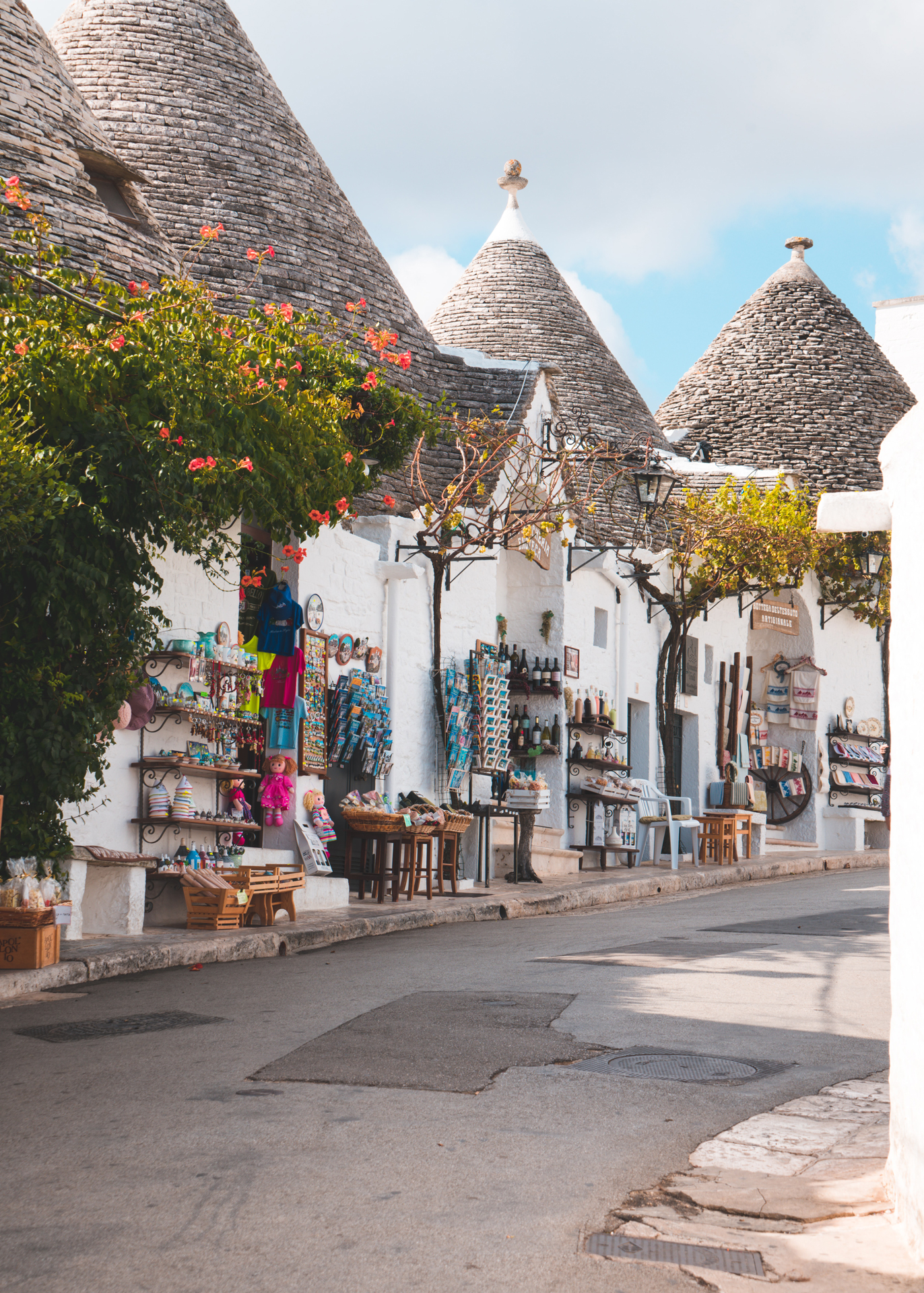 White limestone dwellings found in the southern region of Puglia featuring conical roofs built up of limestone slabs.