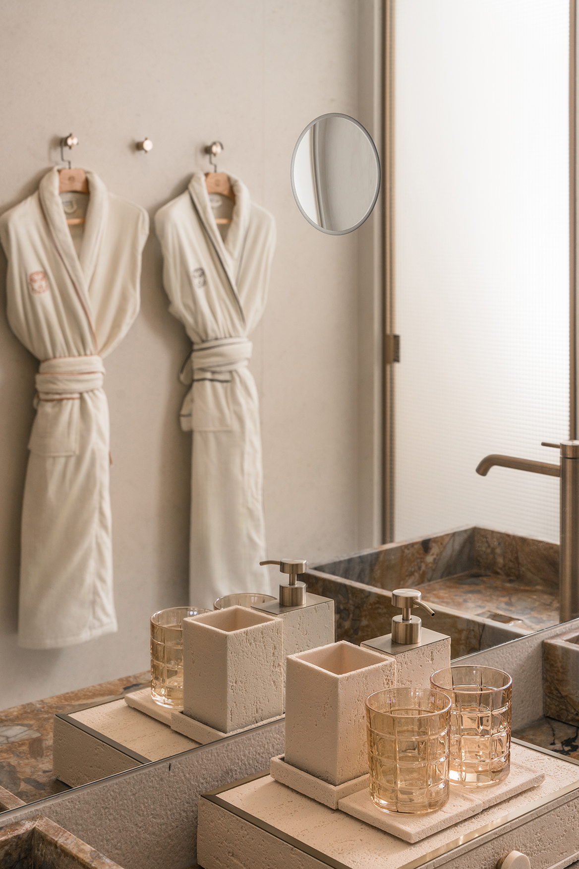 Europe, Croatia, Villa Dubrovnik, Bathroom sink detail with two bathrobes visible in the mirror 