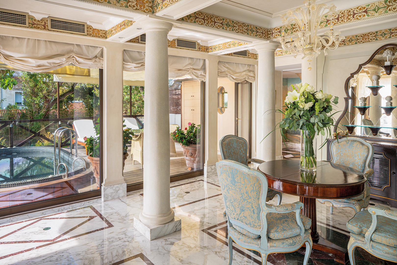 Europe, Italy, Venice, Hotel Cipriani, A Belmond Hotel, Venice, Table and chairs with window out