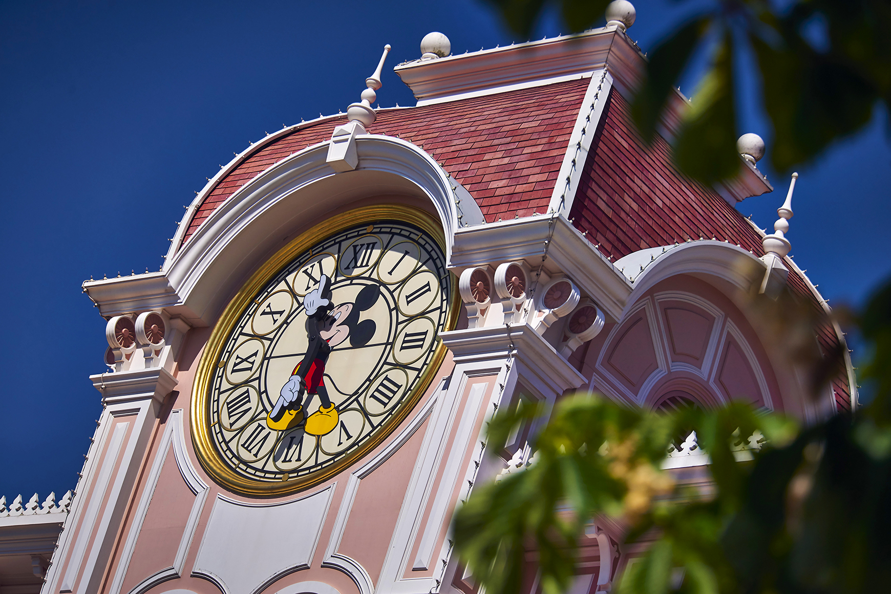 Europe, France, Paris, Disneyland® Hotel, Mickey Mouse clock on the facade of the hotel