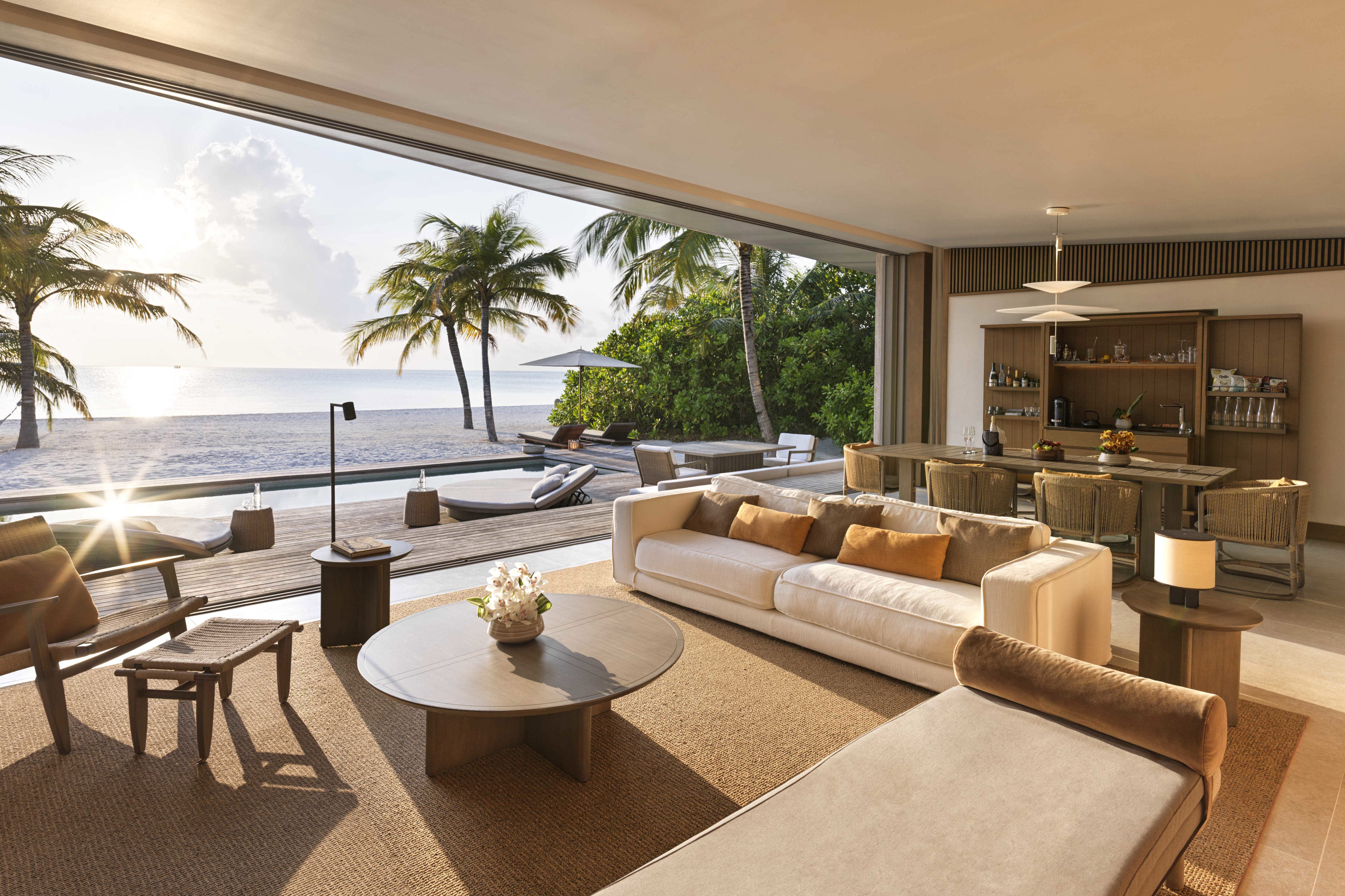Lounge and dining area of two bedroom beach villa at Ritz-Carlton Fari Islands