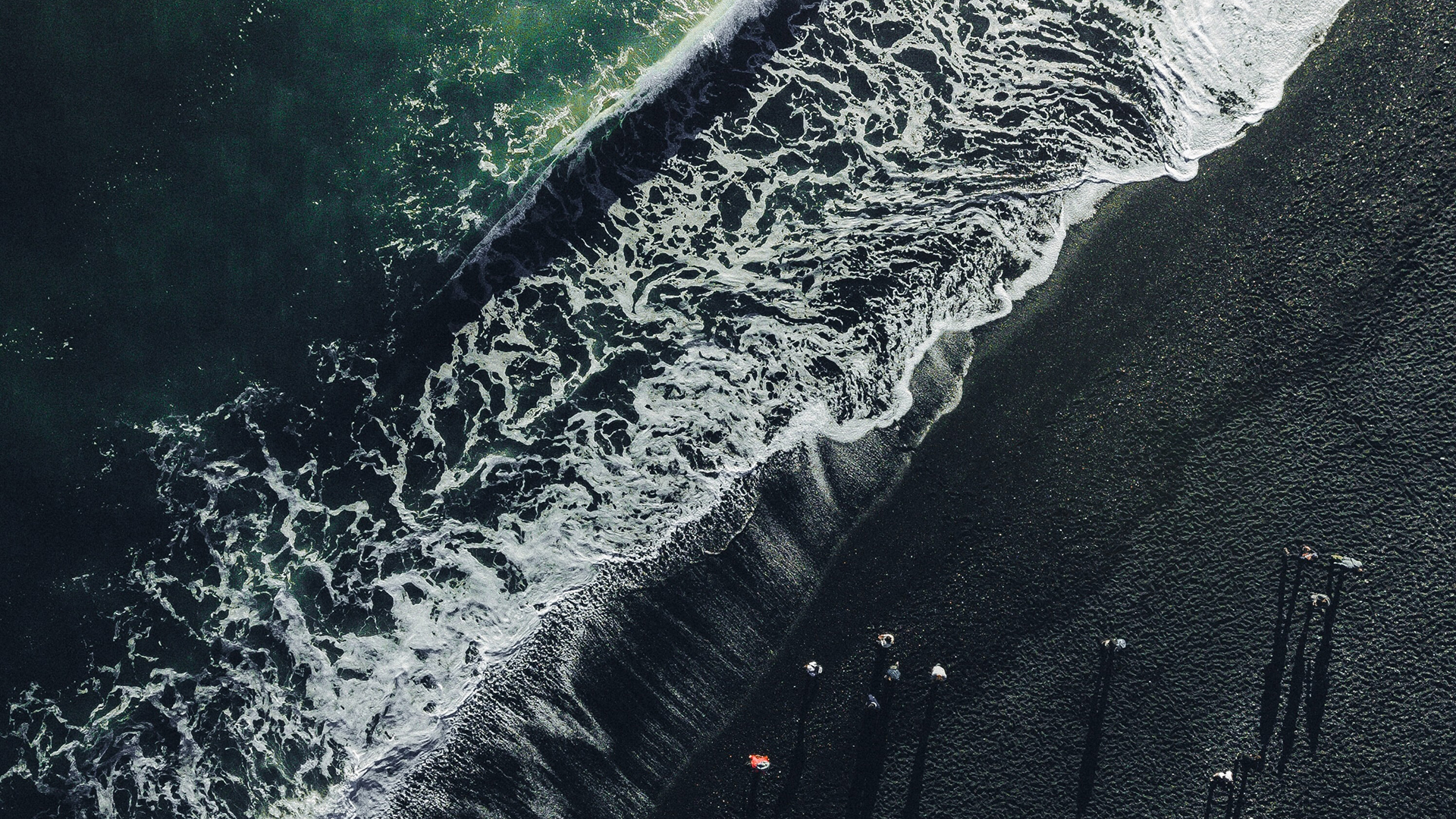 Sea and black sand