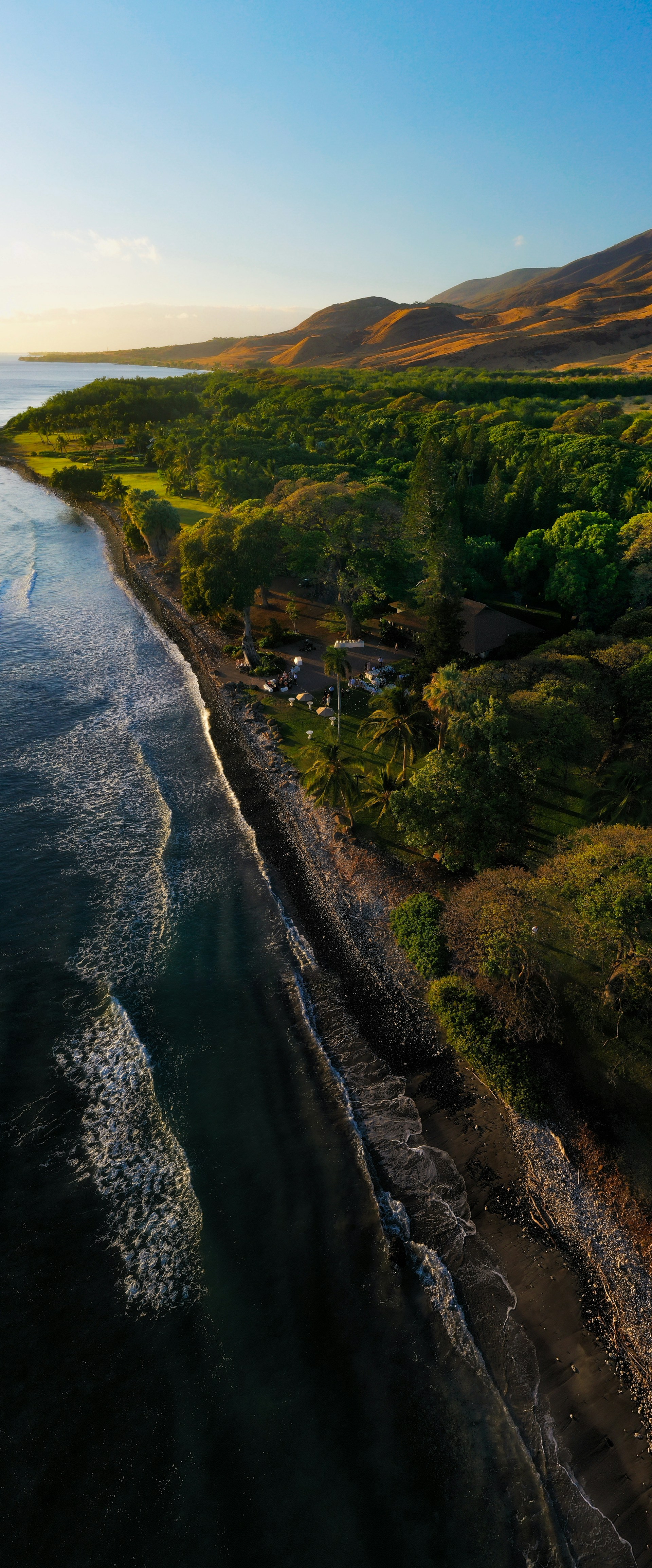 Coastal landscape and golden hills along Maui's shoreline, Hawaii