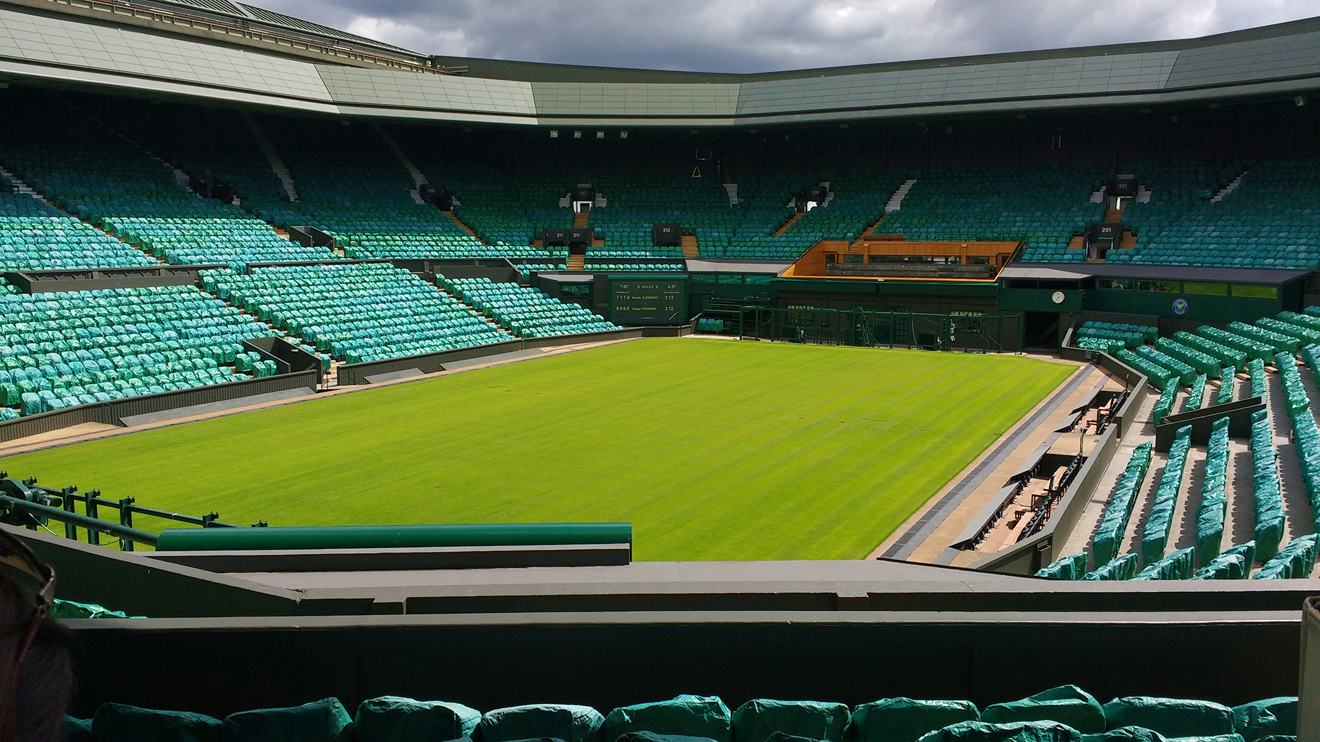 An empty tennis court at the Wimbledon Championships grounds 