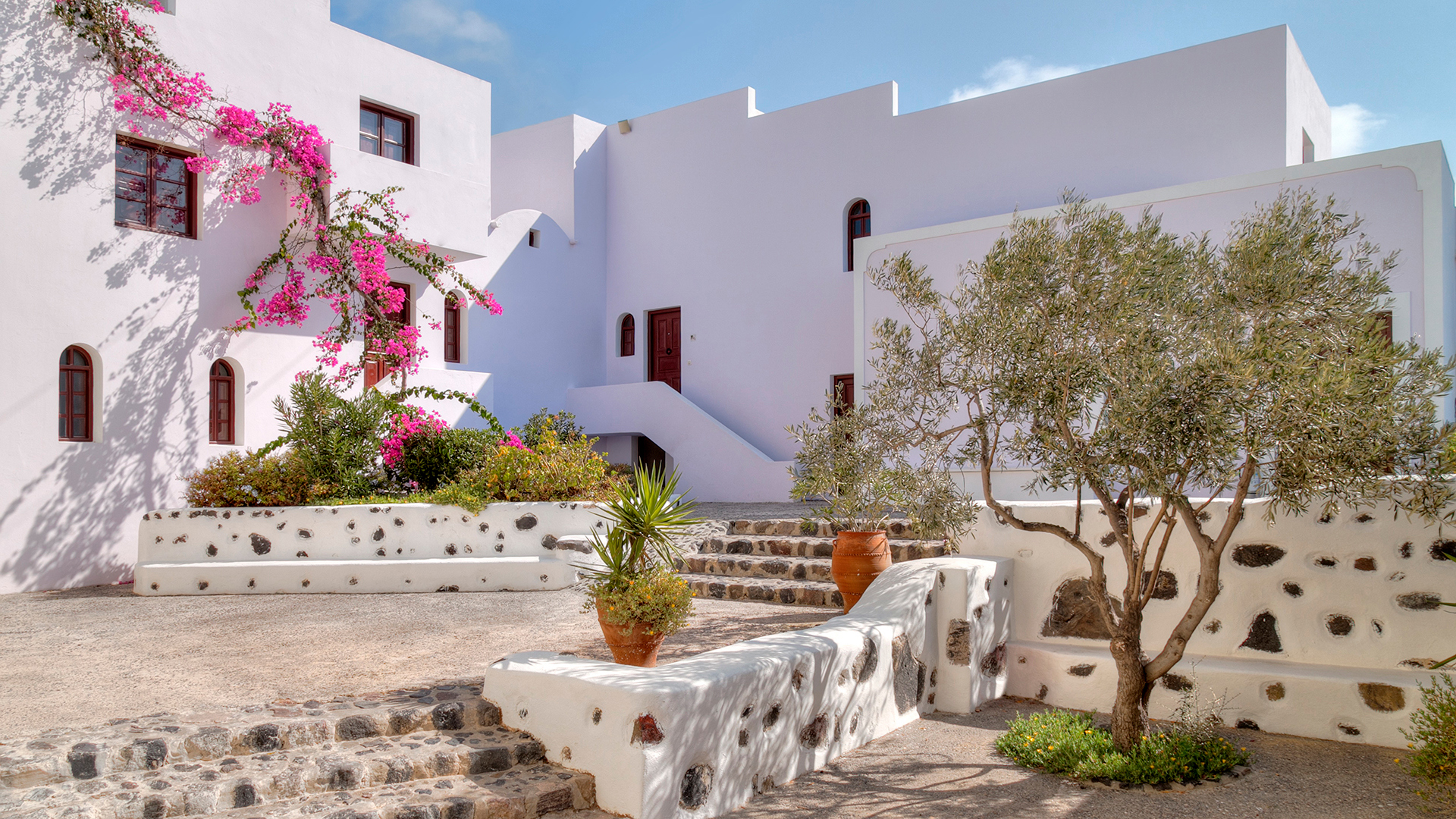 The white concrete exterior of the Vedema resort in Greece