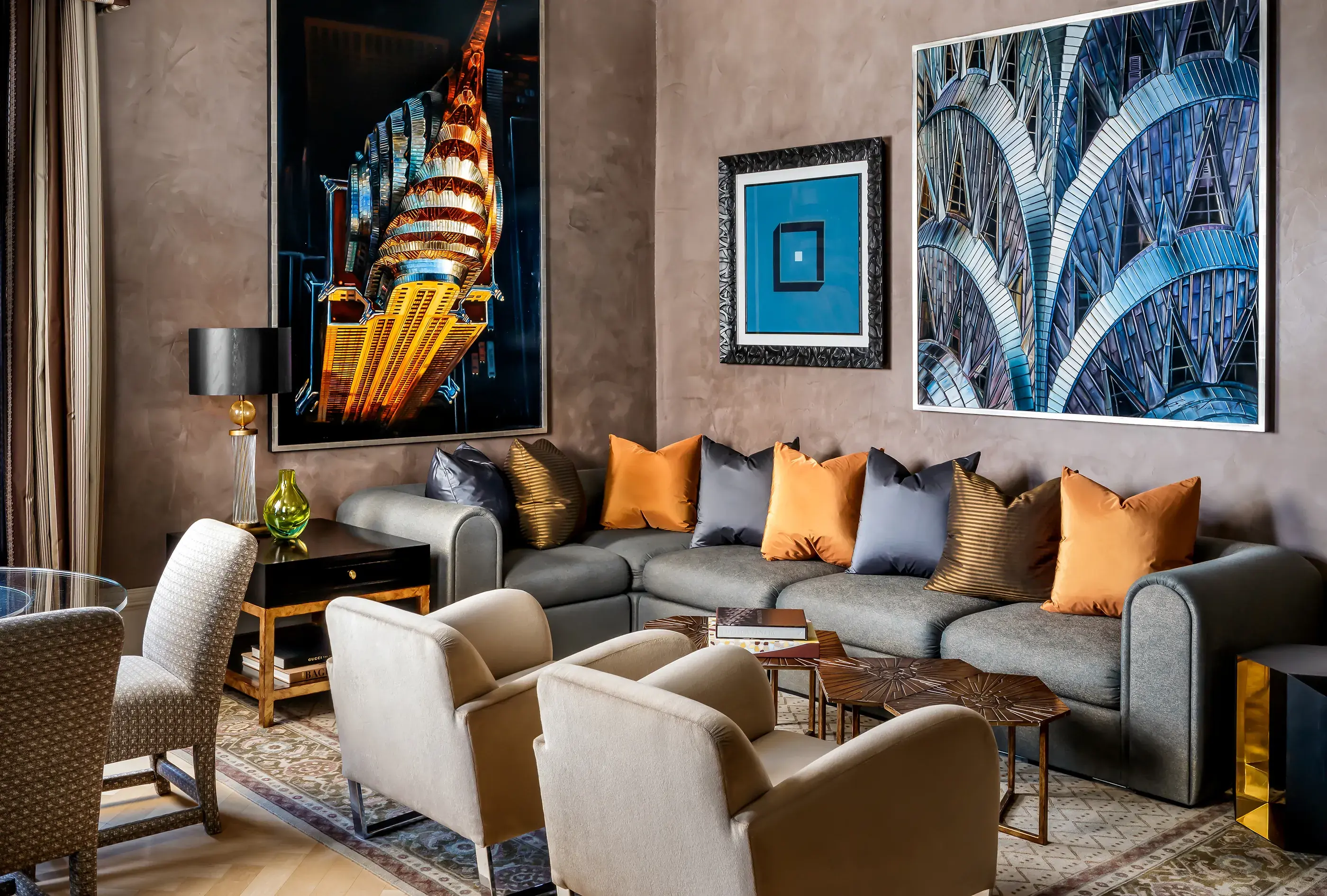 Luxurious modern living area at The Gritti Palace in Venice featuring elegant seating, contemporary artwork, and sophisticated décor.