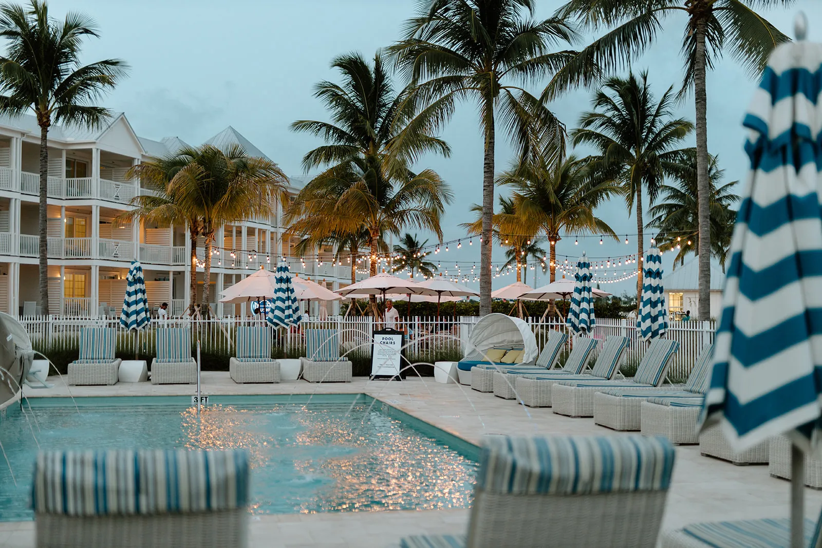 North America, USA, Florida, Isla Bella Beach Resort, sunloungers around the pool