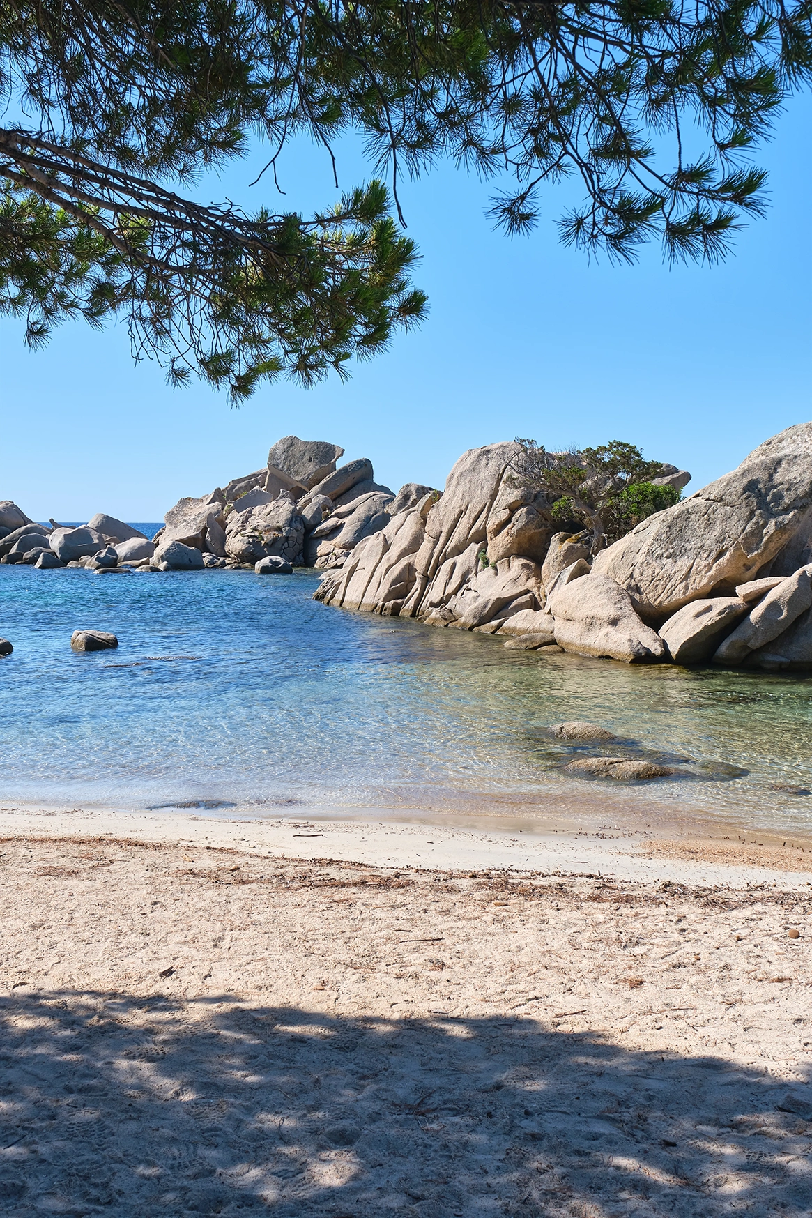 A beach and rocky coastline at Porto-Vecchio, Corsica