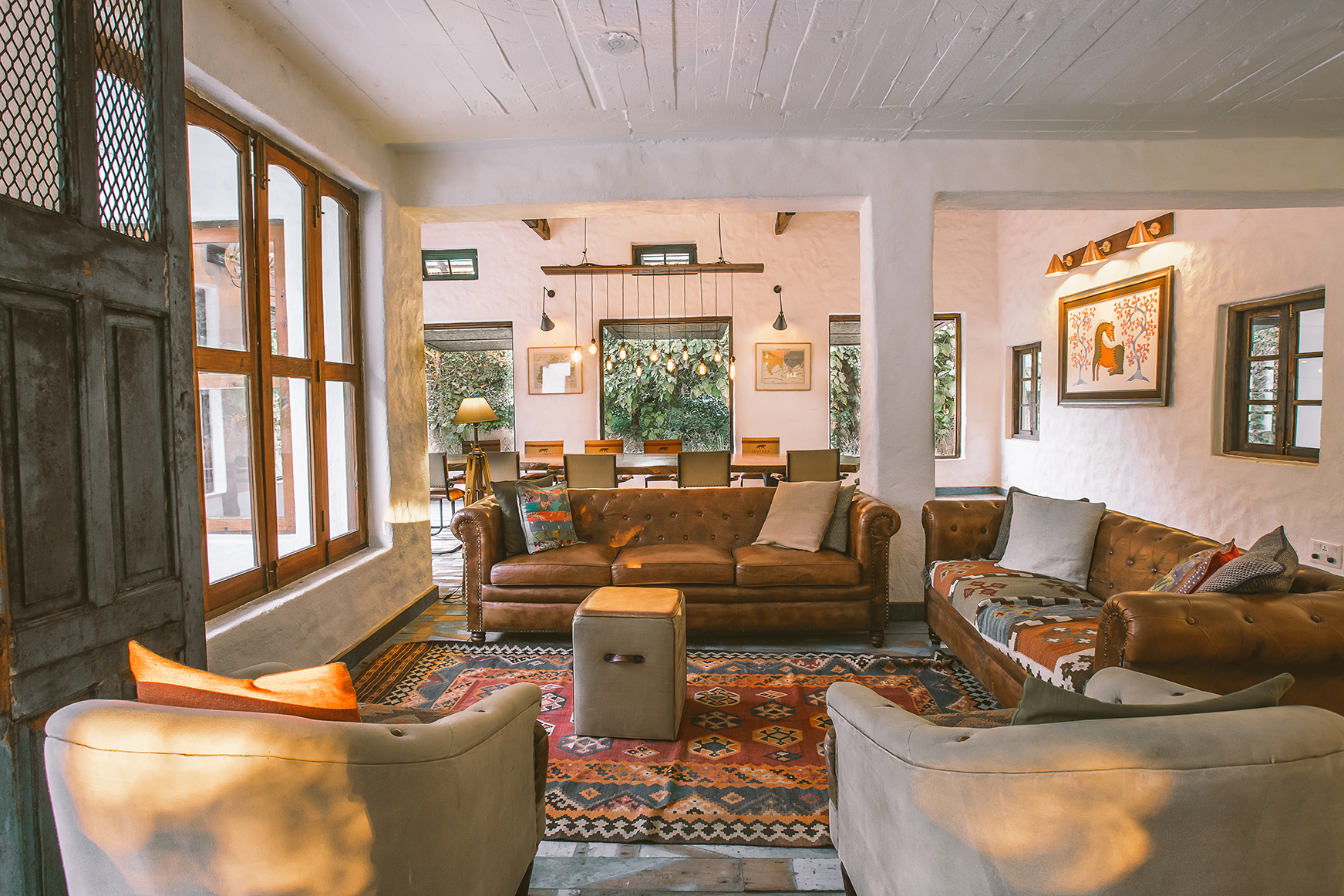 Asia, India, Jamtara Wildreness Camp, sofas in a lounge area next to the dining area