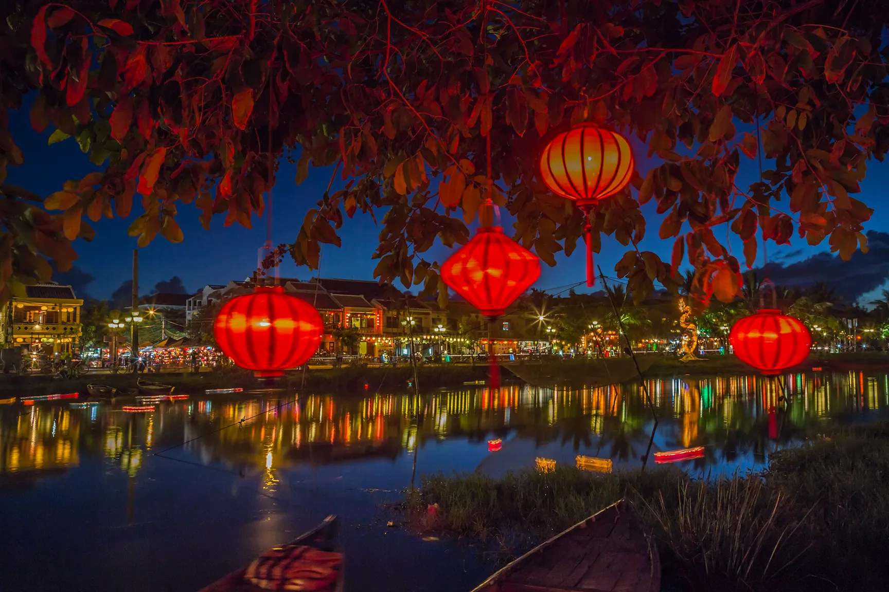 Lanterns and colorful lights on river in Hoi An, Vietnam
