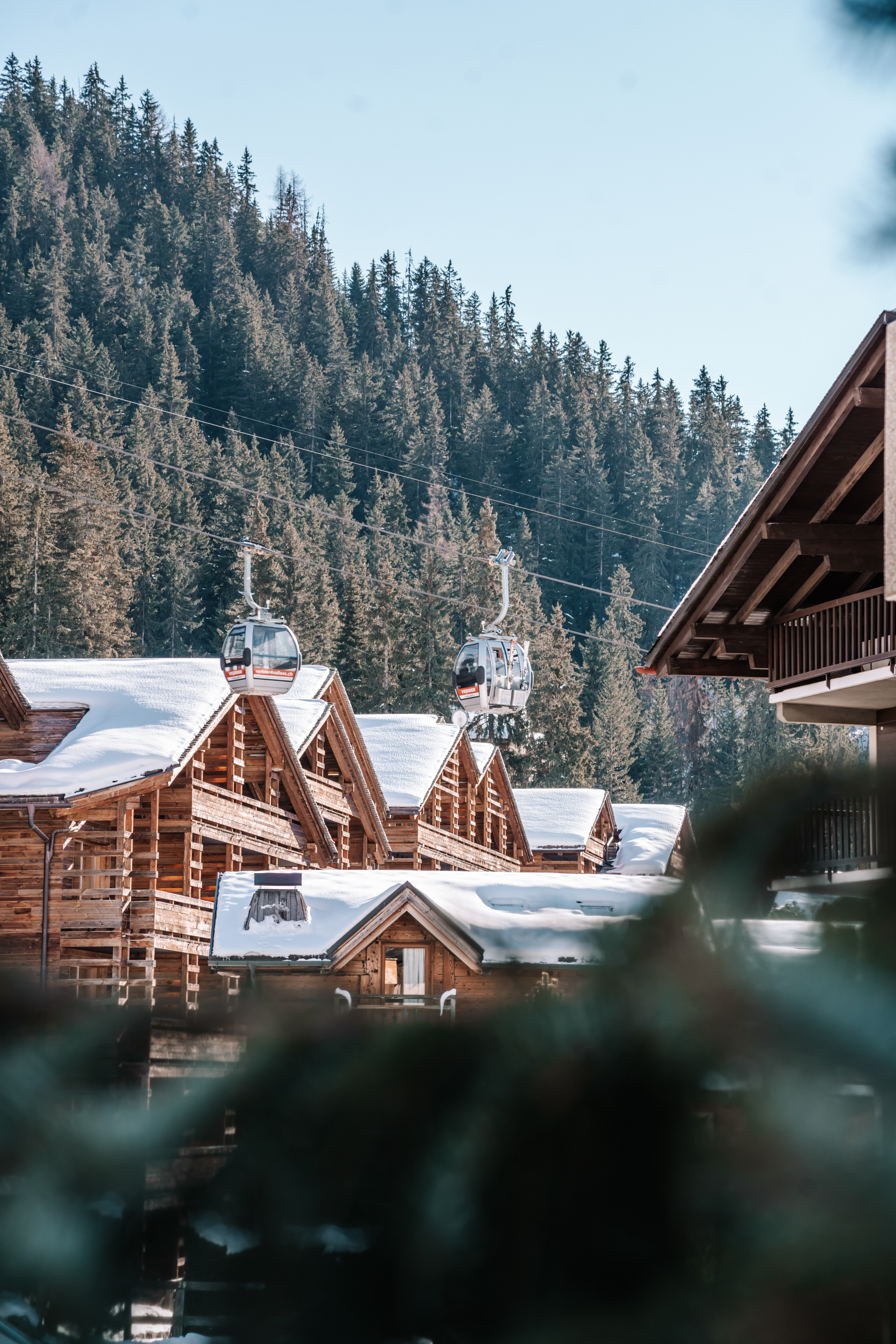 Snow covered log cabins in Verbier, Siwtzerland