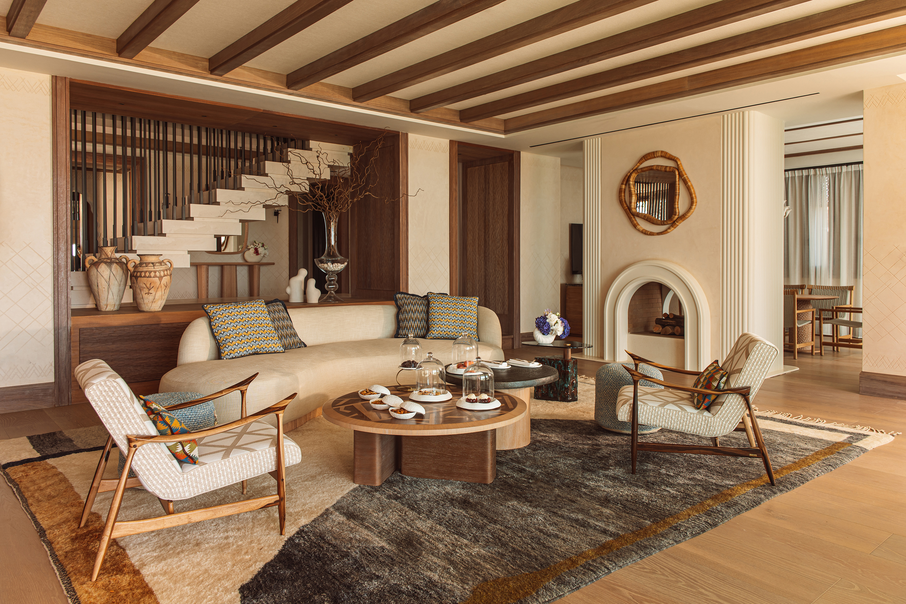 The comfy lounge of a prestige Villa featuring stylish furniture and eclectic Moroccan decor