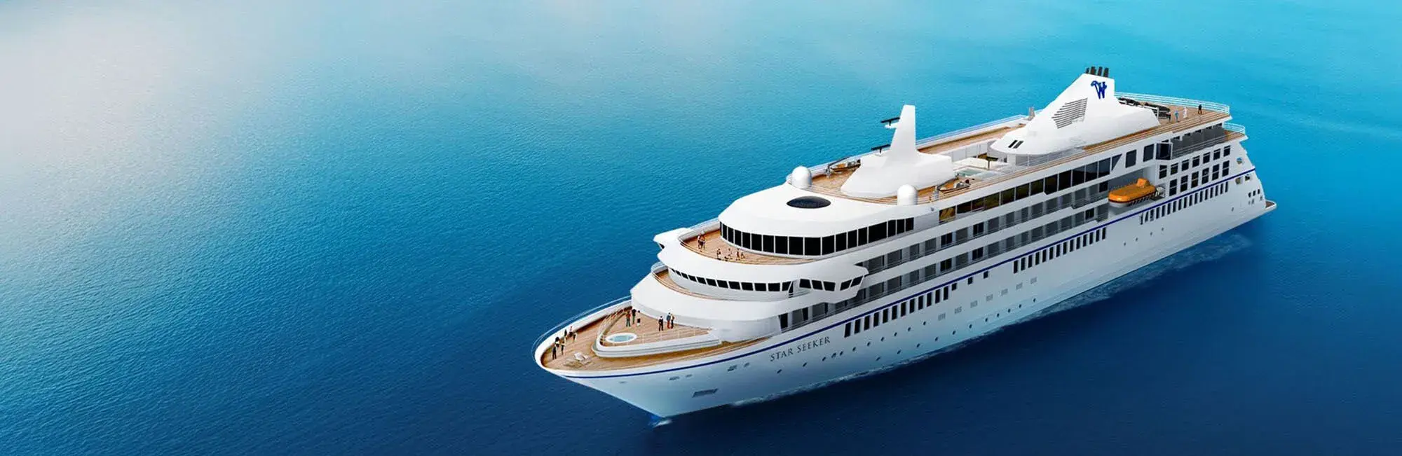 A large white cruise ship named "Star Seeker" sailing on a calm blue ocean.