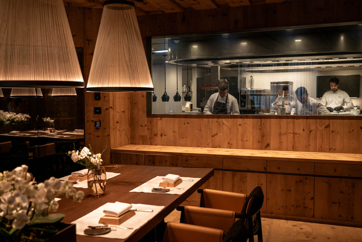 Europe Ski, Italy, Gardena Grodnehof, restaurant dining tables with view into the kitchen