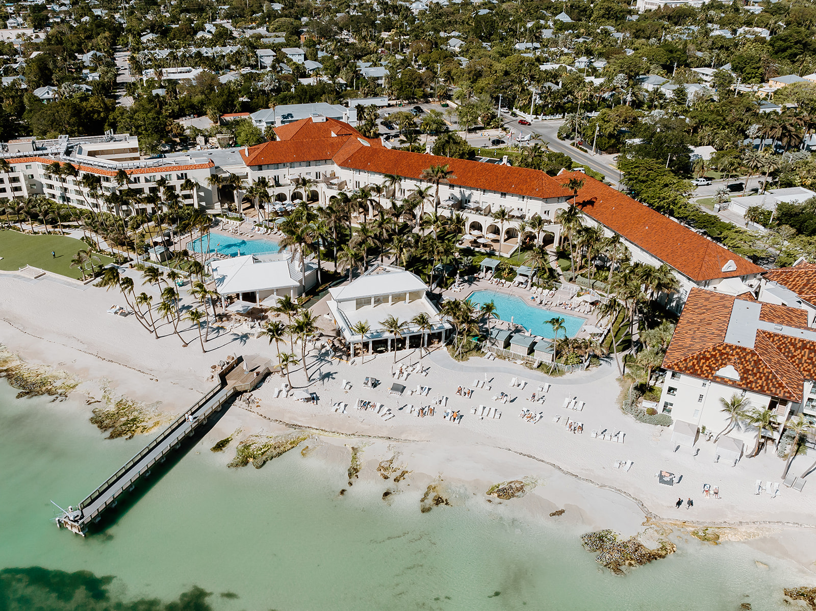 A view from above of Casa Marina Key West, Florida, and the beach, taken by a drone