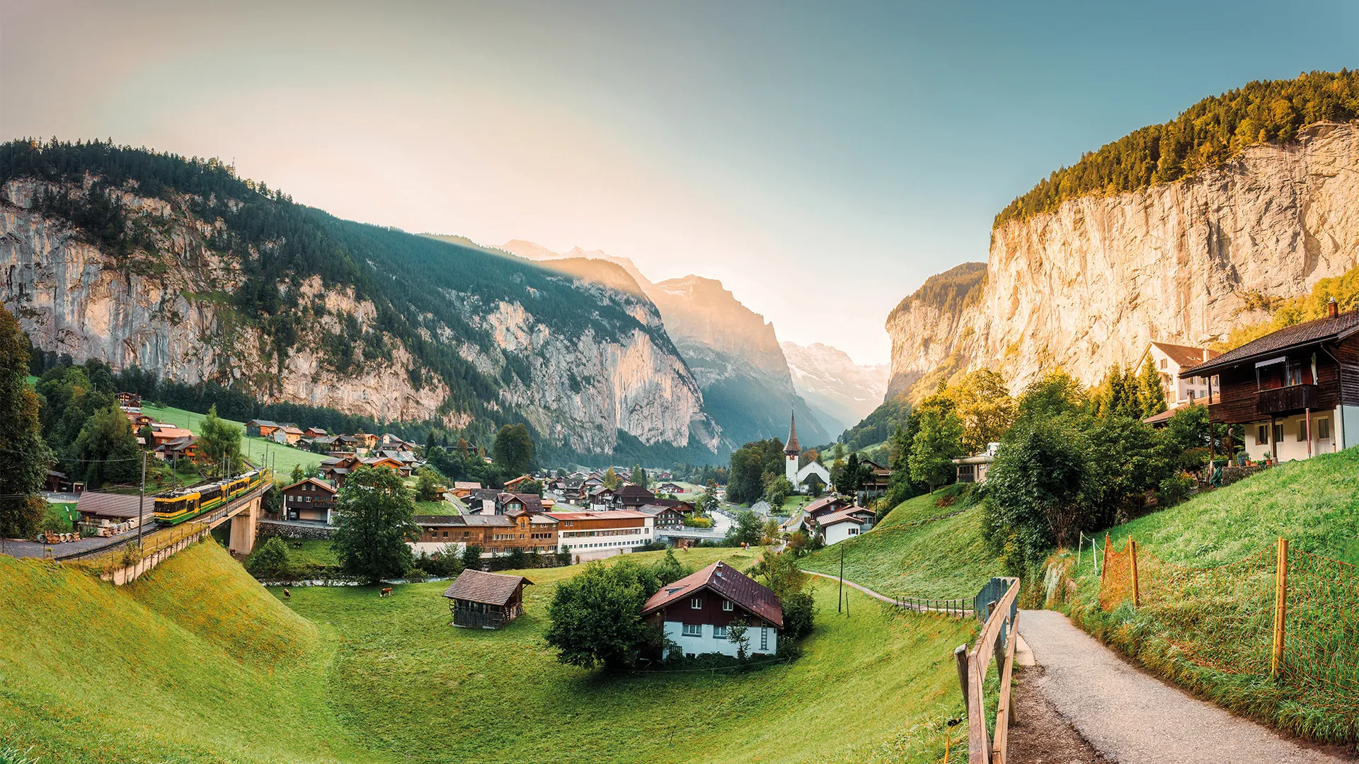 A view of a village in the Swiss Alps in summer