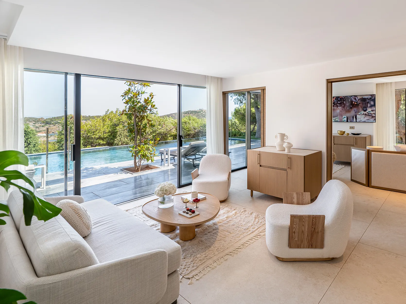 Europe, Greece, Athens Riviera, Cape Sounio, indoor living area of a pine hill villa