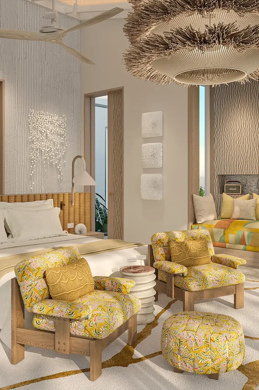 Elegant bedroom at .Here Resort in the Maldives featuring modern tropical design and luxury furnishings.