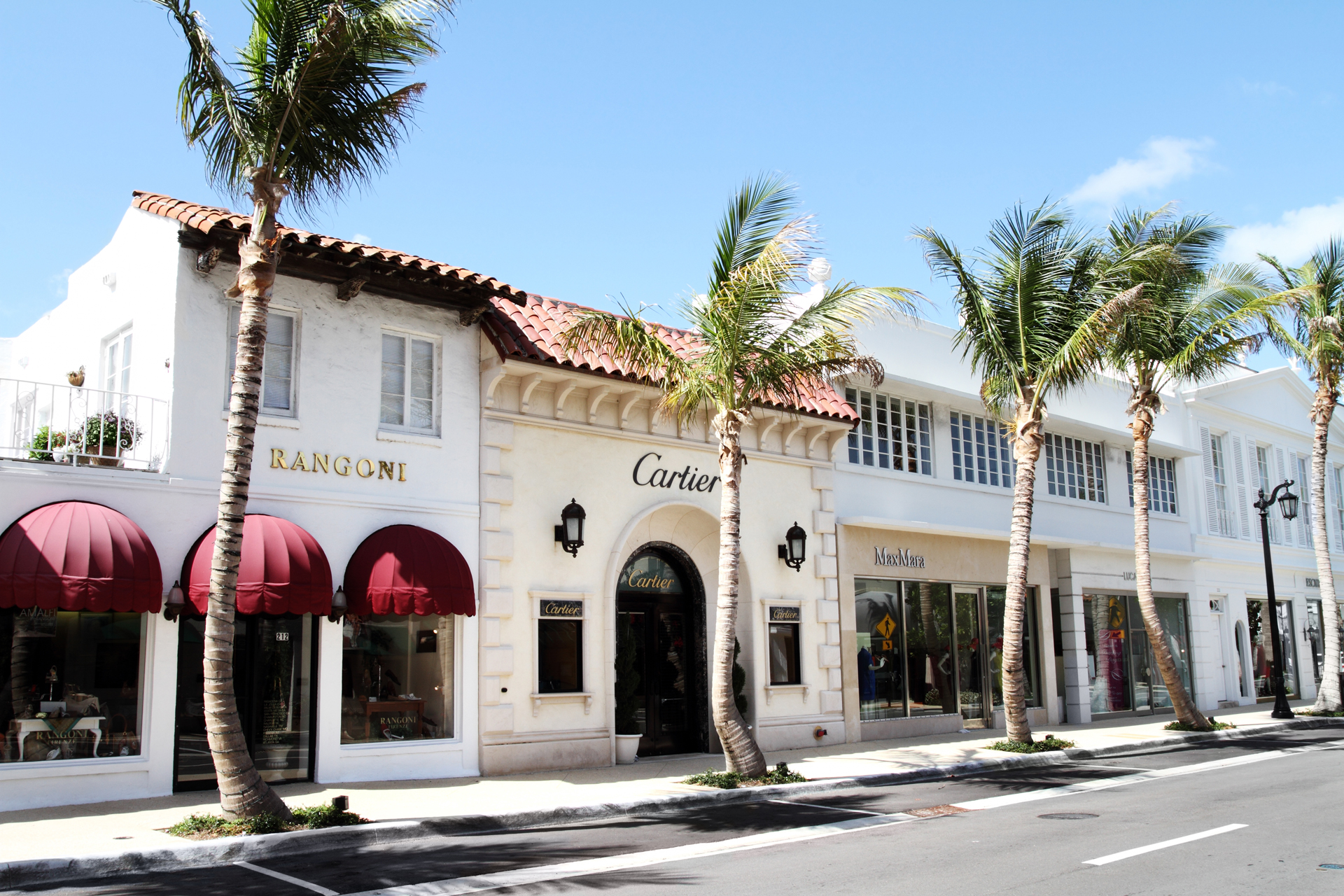 This is a view of Worth Avenue in Palm Beach Florida. Several high end designer goods retail stores line this section of the street