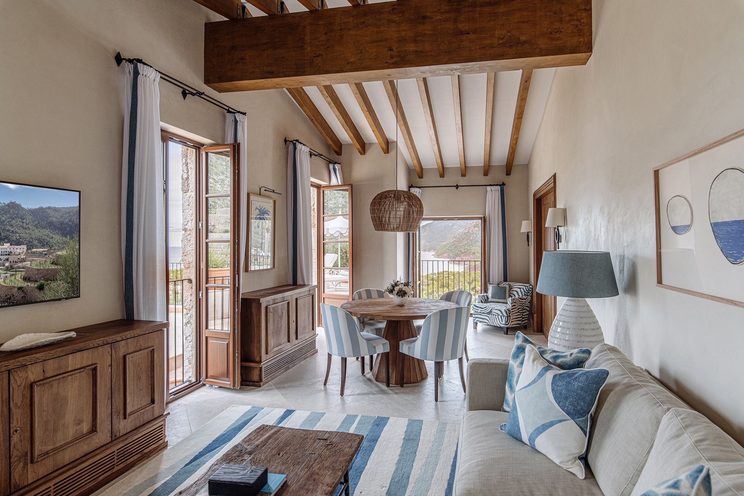 Tafona Suite lounge with blue and white soft furnishings and period features