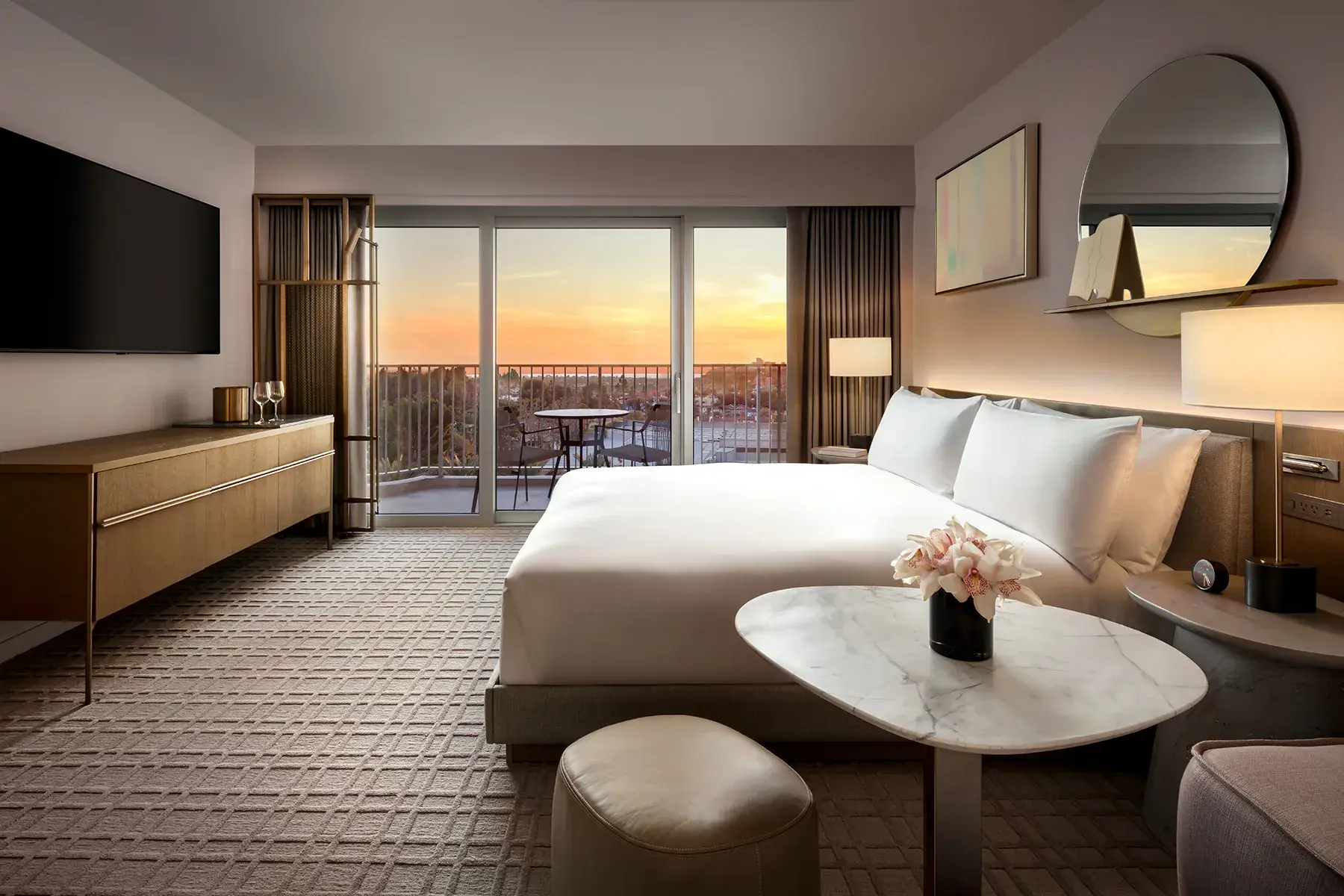 Modern King Sunset guest room at Fairmont Century Plaza in Los Angeles featuring a private balcony and panoramic sunset views.”