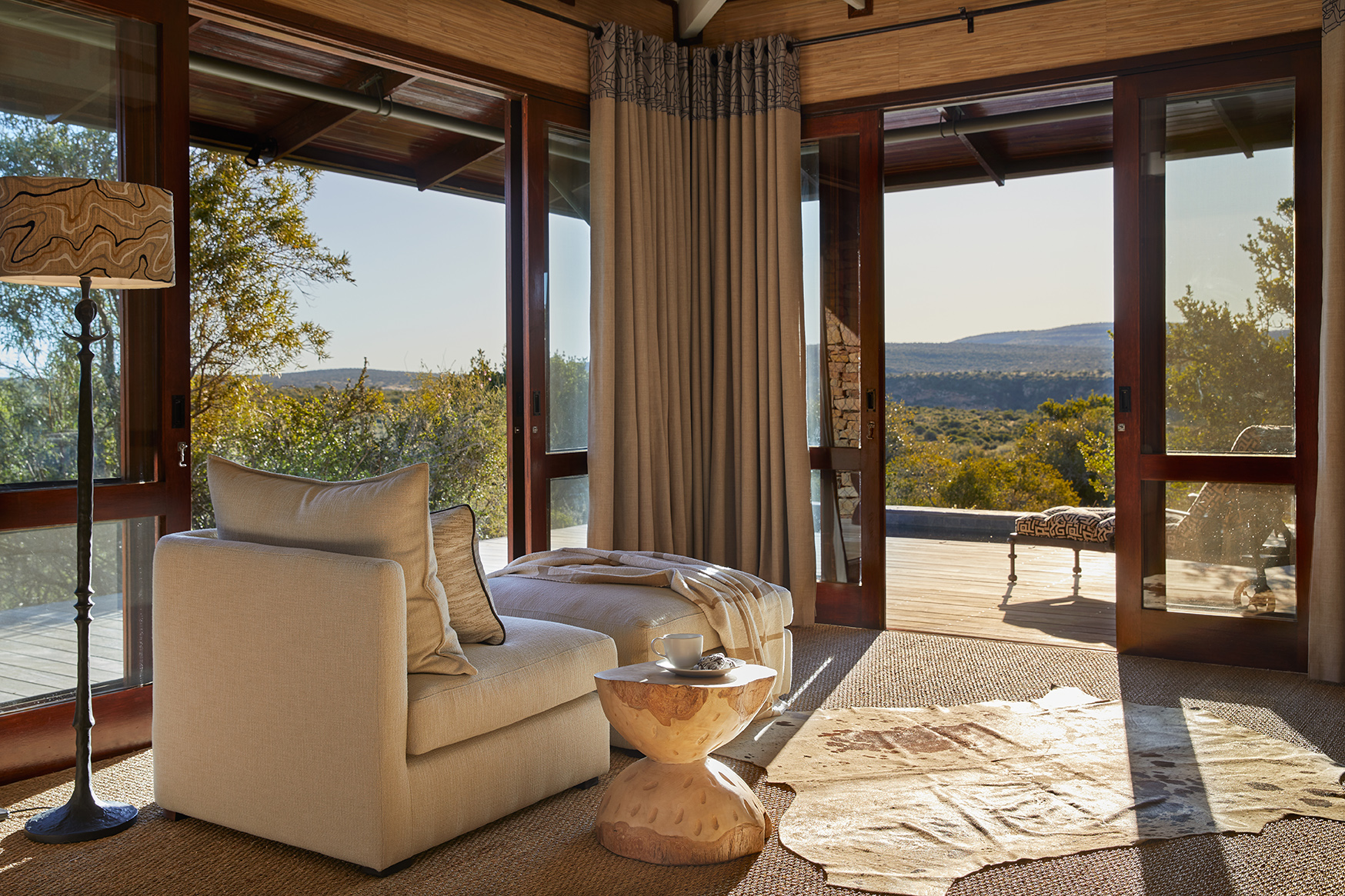 Africa, South Africa, Kwandwe Private Game Reserve, Ecca Lodge, chaise lounge in bedroom
